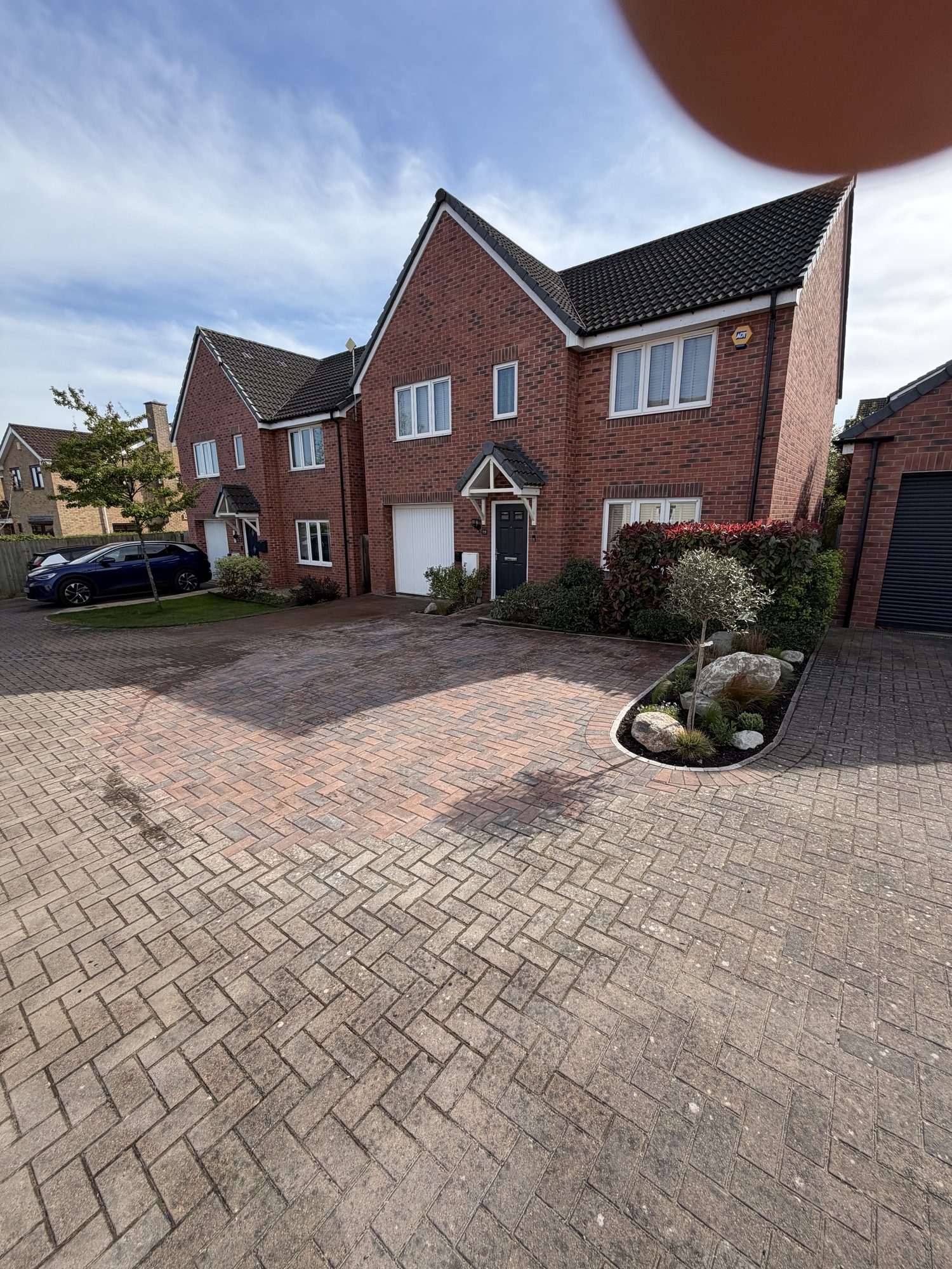 Full block-paving driveway and house frontage